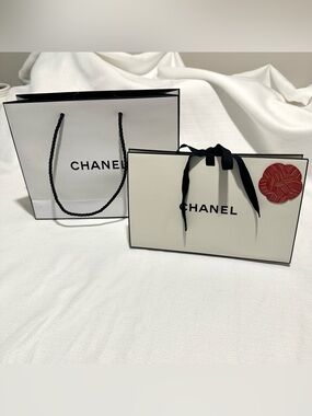 Authentic Chanel shopping bag lot with medium and small gift bags